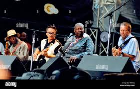 Blues Legends: Buddy Guy, Eric Clapton, and B.B. King – Masters of the Guitar