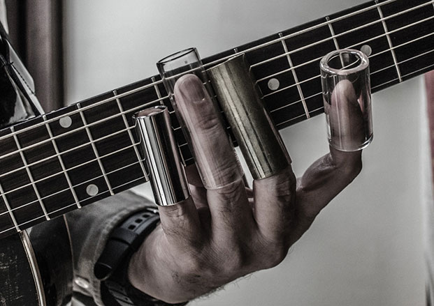 The Soulful Sounds of a Slide Guitarist: Exploring the Artistry and Emotion